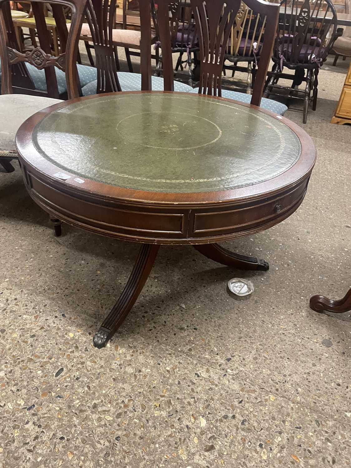 Leather topped drum style coffee table on tripod base, 86cm diameter