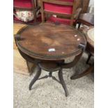 Early 20th Century two tiered circular occasional table with brass gallery