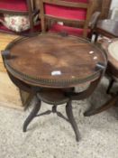 Early 20th Century two tiered circular occasional table with brass gallery