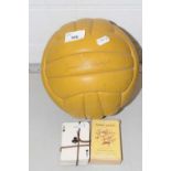 A vintage football marked 'Jimmy Greaves' together with vintage playing cards