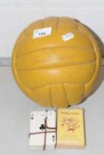 A vintage football marked 'Jimmy Greaves' together with vintage playing cards