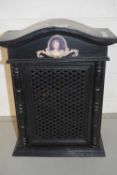 A modern black painted table top cabinet