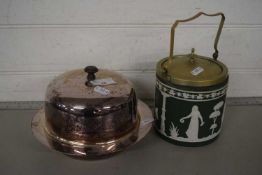 A silver plated muffin dish together with a Jasper ware biscuit barrel