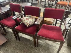 Set of three red upholstered chairs