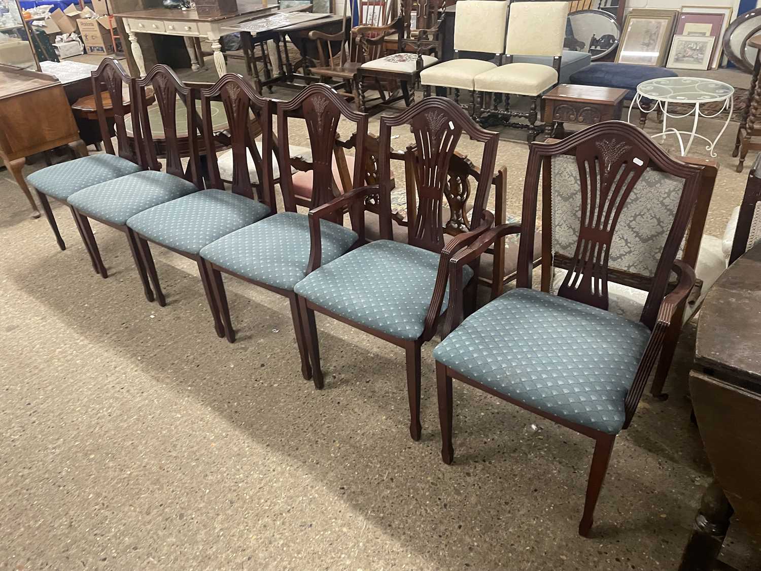 A set of six reproduction wheatsheaf back dining chairs