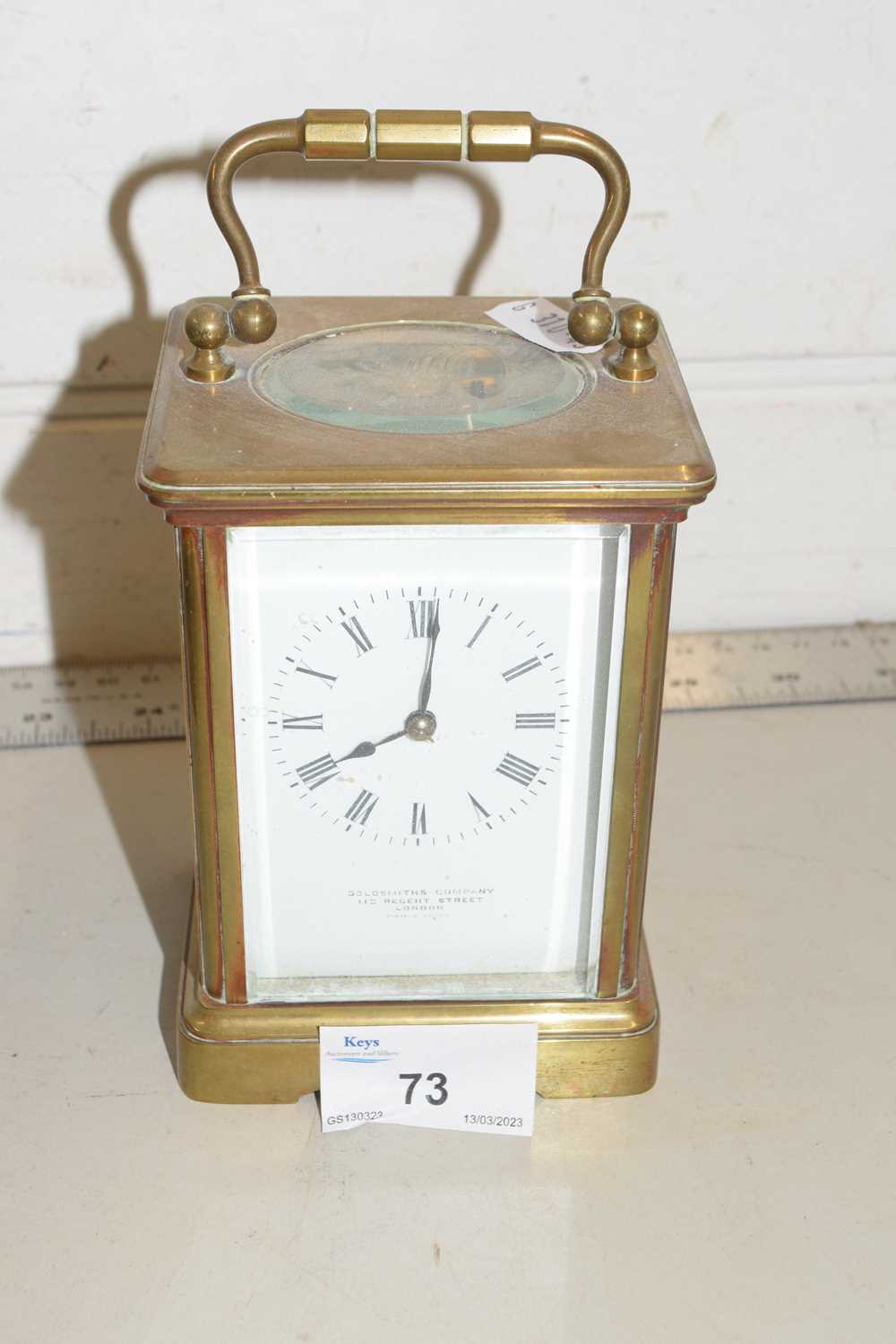 A brass cased carriage clock, the dial marked Goldsmiths Company, 112 Regent Street, London