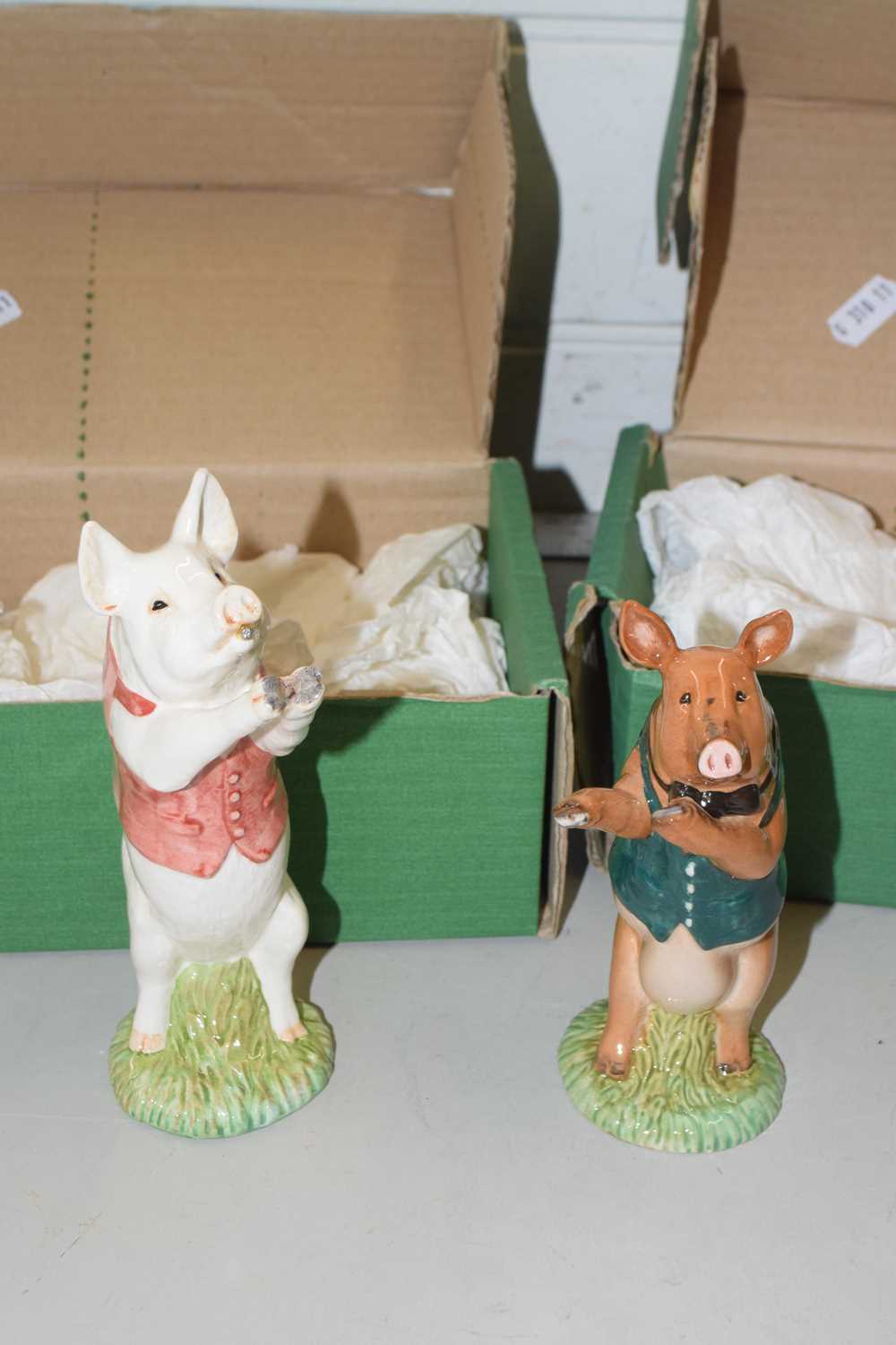 Two Beswick pig models, David and Matthew, bearing gold signatures to base