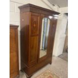 Edwardian mahogany wardrobe with central mirrored door and drawer base