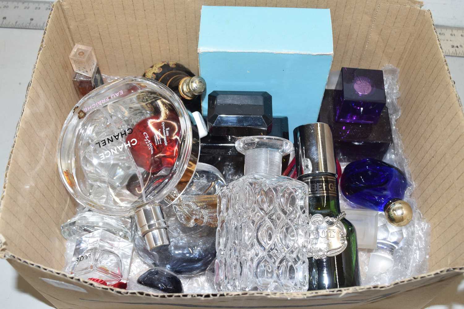 Box of various assorted perfume