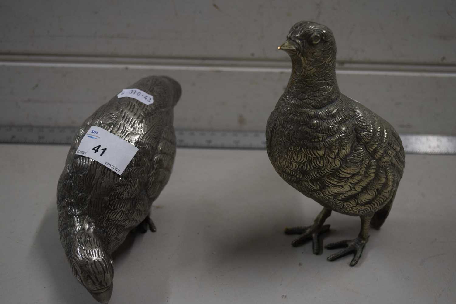 A pair of silver plated partridge models