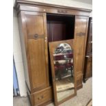 Edwardian mahogany wardrobe with central mirrored door and draw base, 152cm wide