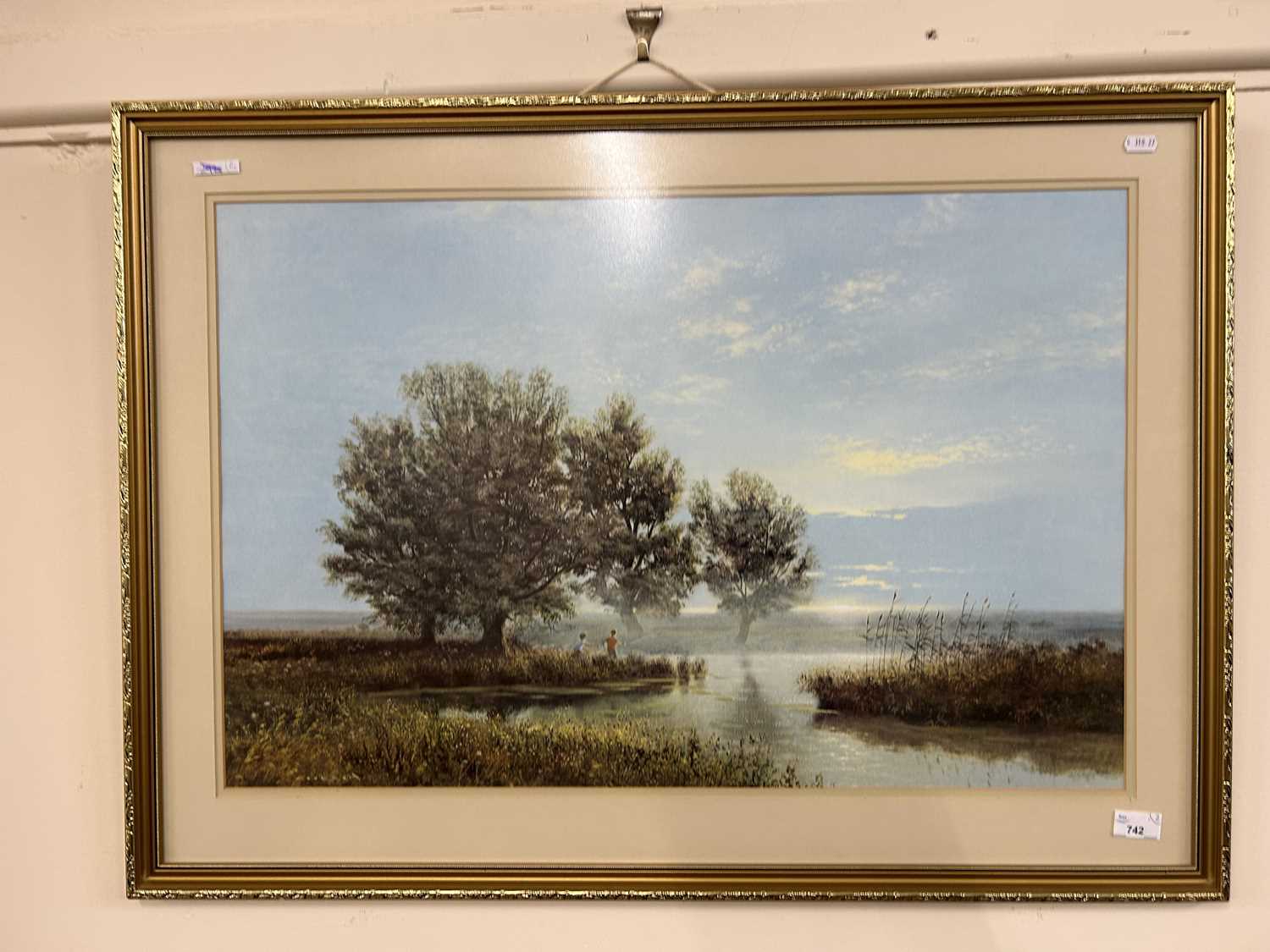 A reproduction colour print of a landscape by David Shepherd, framed and glazed together with