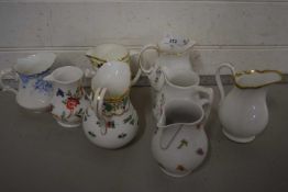 Collection of various decorated jugs, assorted patterns