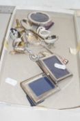 Mixed Lot: Miniature silver mounted photograph frames, various collectors spoons etc