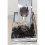 Mixed lot comprising two fur cuffs and a feather brooch
