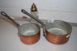 Mixed Lot: Two small copper saucepans and a sugar caster