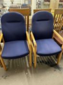 Pair of light wood framed armchairs