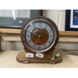 Art Deco style mantel clock in oak veneered case