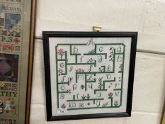 Modern needlework sampler formed as a maze with letters of the alphabet