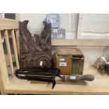 Mixed Lot: Cast iron iron stand, quantity of door handles and two carved wooden all brackets