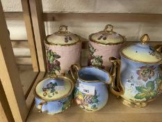 Quantity of Canterbury fine china wares to include three piece tea set and two covered jars
