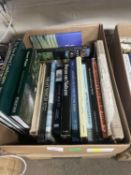 A box of hardback books on natural history