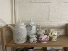 Two teapots, two milk jugs and a quantity of other ceramics
