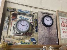 A pair of composite modern montage wall clocks of motoring interest