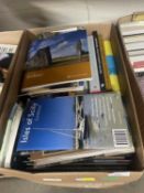 A box of assorted maps, travel guides, hardback books etc