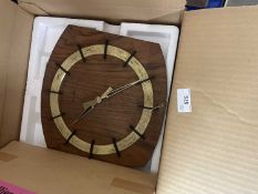 A Kieninger wooden and brass effect mid 20th Century wall clock