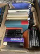 A box of assorted arts reference and other books