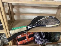 Three squash rackets, one cased