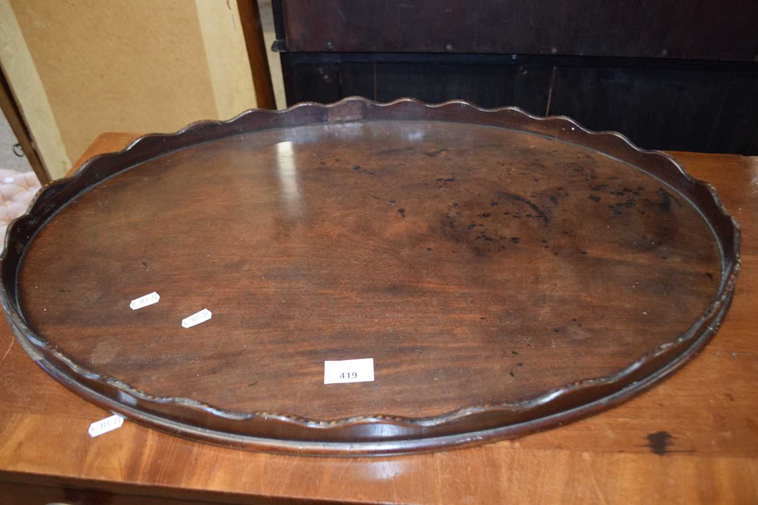 19th Century mahogany oval serving tray with galleried surround, 71cm wide