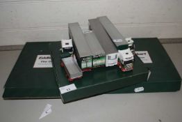 A collection of Eddie Stobart toy lorries and related items
