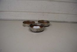 Three silver plated and wood coasters