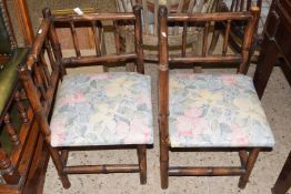 Pair of bamboo framed corner chairs with upholstered seats, 70cm high