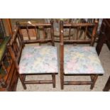 Pair of bamboo framed corner chairs with upholstered seats, 70cm high