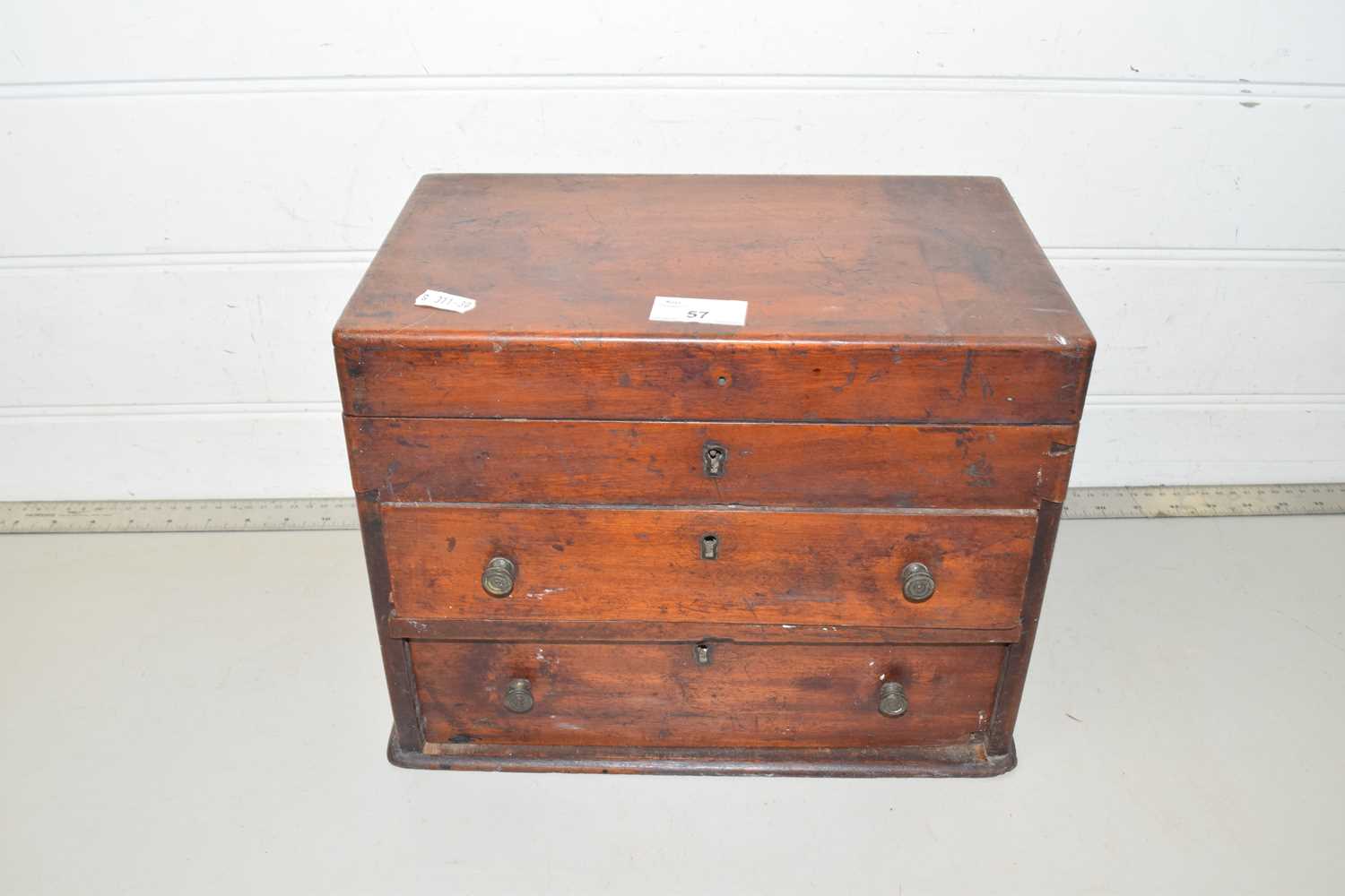 Small hardwood table top cabinet containing various assorted costume jewellery