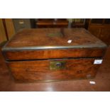 A 19th Century walnut and brass bound writing box, requiring some restoration, 40cm wide