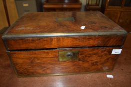 A 19th Century walnut and brass bound writing box, requiring some restoration, 40cm wide