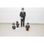 Mixed Lot: Royal Doulton model British policeman and a policeman bunnikins figure plus two others