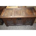 18th Century oak coffer with three panelled carved front