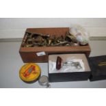 Box of various brass coat hooks, ornaments, cruet, golfing ornament etc