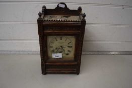 An early 20th Century mantel clock, the face signed Camerer Kuss & Co, New Oxford Street, London