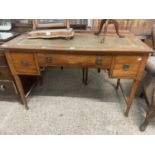 Edwardian mahogany leather top writing table with three drawers, 122cm wide