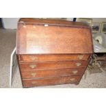 Georgian oak and mahogany cross banded bureau with four drawer base