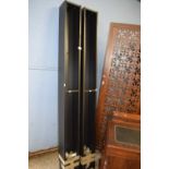 Pair of dark wood narrow book or CD racks