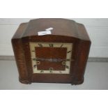 An early 20th Century oak cased mantel clock