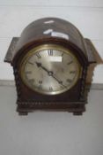 Early 20th Century oak cased mantel clock with barley twist detail