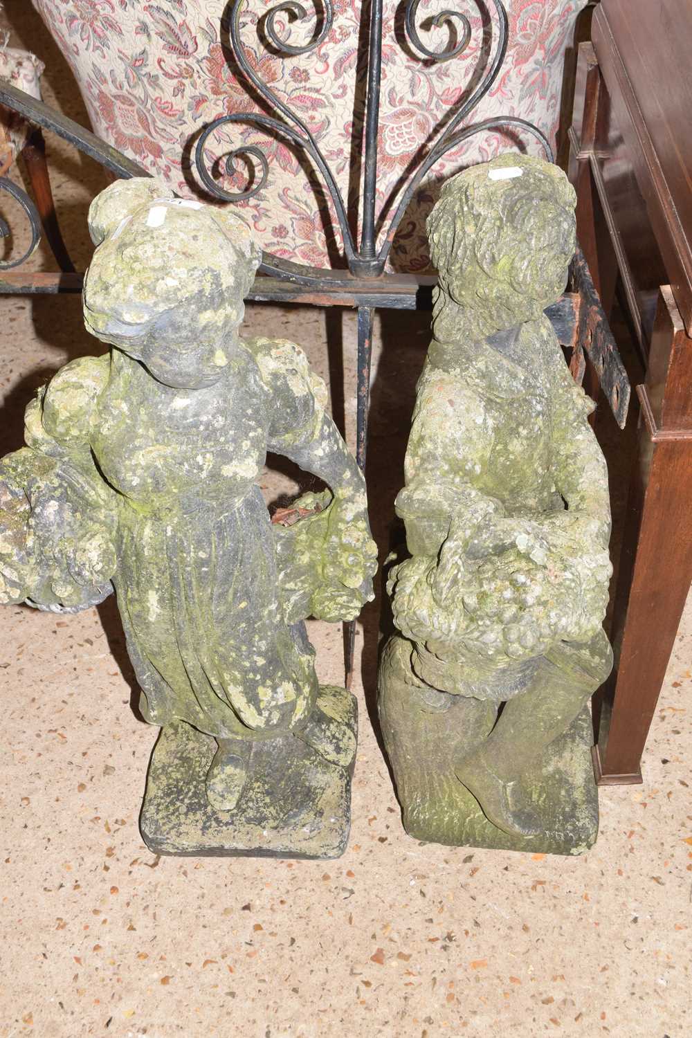 Pair of concrete garden statues